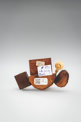 Lot 309 - A LOT WITH TWO TOKYO SCHOOL INLAID WOOD OKIMONO OF SELLERS