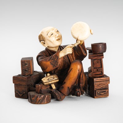 Lot 309 - A LOT WITH TWO TOKYO SCHOOL INLAID WOOD OKIMONO OF SELLERS