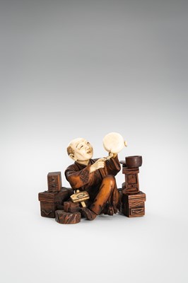 Lot 309 - A LOT WITH TWO TOKYO SCHOOL INLAID WOOD OKIMONO OF SELLERS