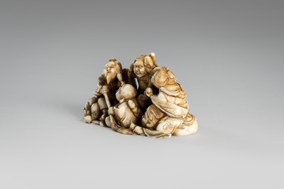 Lot 314 - RYOMIN: A FINE IVORY NETSUKE OKIMONO OF THE SHICHIFUKUJIN (SEVEN LUCKY GODS)