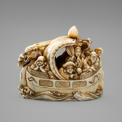Lot 258 - RYUYA: A FINE IVORY NETSUKE DEPICTING THE SEVEN LUCKY GODS ON THE TAKARUBUNE (TREASURE BOAT)