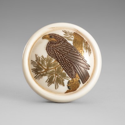 Lot 1767 - A SIGNED LACQUERED IVORY MANJU NETSUKE WITH A GOLDEN EAGLE