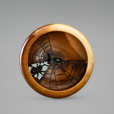 AN IVORY MANJU NETSUKE DEPICTING A SPIDER AND FLY