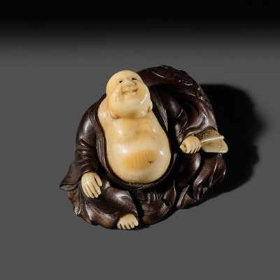 Lot 273 - MITSUNOBU: A FINE IVORY-INLAID WOOD NETSUKE OF HOTEI