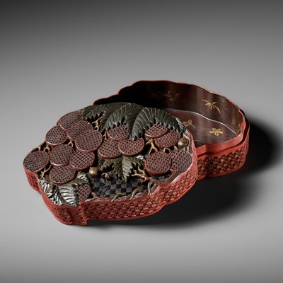 Lot 86 - A THREE-COLORED LACQUER ‘LYCHEE’ BOX AND COVER, 18TH CENTURY