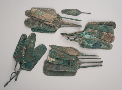 Lot 2126 - A GROUP OF 18 BRONZE TOOLS, c. 12TH OR EARLIER