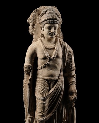 Lot 390 - AN IMPORTANT STUCCO FIGURE OF MAITREYA, ANCIENT REGION OF GANDHARA, 3RD-5TH CENTURY