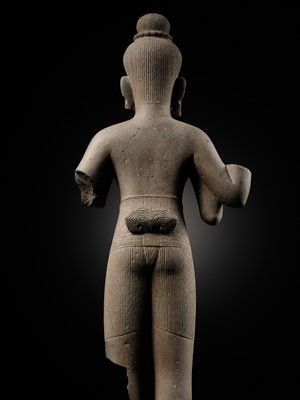 Lot 253 - A FINE SANDSTONE FIGURE OF VISHNU, BAPHUON STYLE, ANGKOR PERIOD