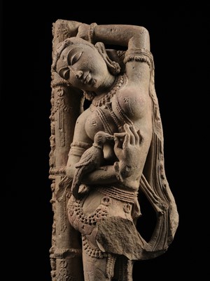 Lot 194 - A PINK SANDSTONE FIGURE OF A CELESTIAL BEAUTY, SURASUNDARI, 11TH CENTURY
