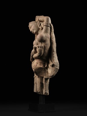 Lot 194 - A PINK SANDSTONE FIGURE OF A CELESTIAL BEAUTY, SURASUNDARI, 11TH CENTURY