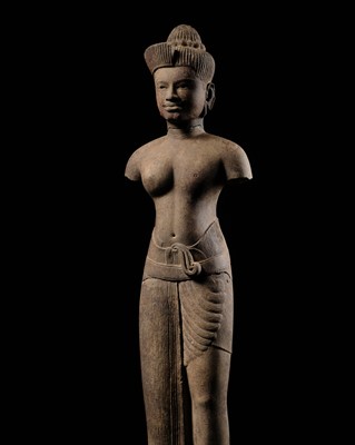 Lot 258 - AN EXCEEDINGLY RARE AND IMPORTANT SANDSTONE FIGURE OF ARDHANARISHVARA, BAPHUON STYLE, ANGKOR PERIOD