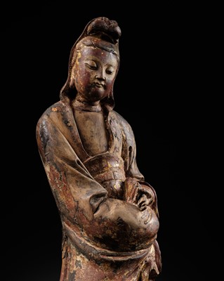 Lot 48 - A GILT-LACQUERED WOOD FIGURE OF STANDING GUANYIN, 16TH-17TH CENTURY