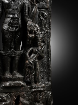 Lot 624 - A BLACK STONE STELE OF VISHNU, PALA PERIOD