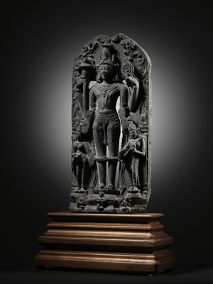 Lot 199 - A SCHIST STELE OF VISHNU, PALA PERIOD, 10TH-12TH CENTURY