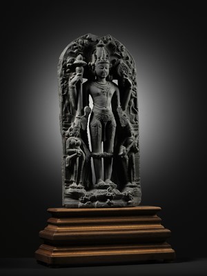 Lot 199 - A SCHIST STELE OF VISHNU, PALA PERIOD, 10TH-12TH CENTURY