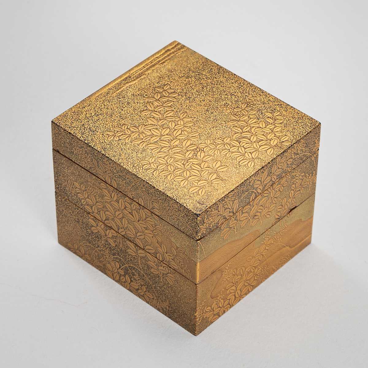 Lot 104 - A SMALL TWO-TIERED LACQUER KOGO (INCENSE BOX) AND COVER