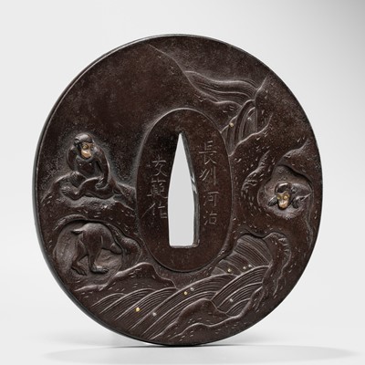 Lot 628 - TOMONORI: A FINE IRON CHOSHU SCHOOL TSUBA WITH MONKEYS ON ROCKS