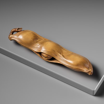 Lot 111 - TETSUGENDO KYUSAI: A MASTERFUL WOOD SASHI NETSUKE OF A NATAMAME (SWORD BEAN)