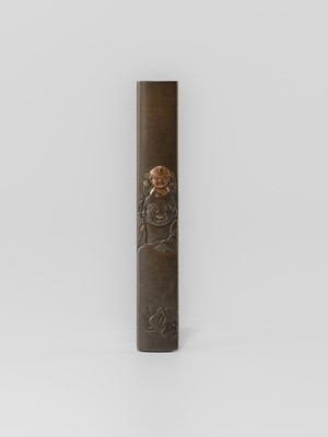 Lot 631 - OKAWA TEIKAN: A SHIBUICHI KOZUKA DEPICTING HOTEI AND KARAKO, AFTER A DESIGN BY HANABUSA ITCHO