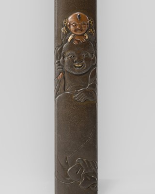 Lot 631 - OKAWA TEIKAN: A SHIBUICHI KOZUKA DEPICTING HOTEI AND KARAKO, AFTER A DESIGN BY HANABUSA ITCHO