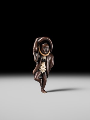 Lot 216 - MIWA: A RARE WOOD NETSUKE OF A SPARROW DANCER