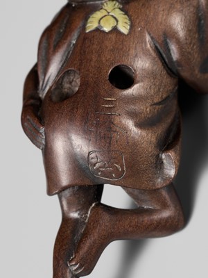 Lot 216 - MIWA: A RARE WOOD NETSUKE OF A SPARROW DANCER