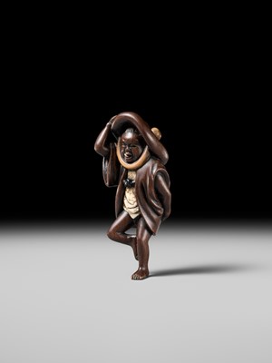 Lot 216 - MIWA: A RARE WOOD NETSUKE OF A SPARROW DANCER