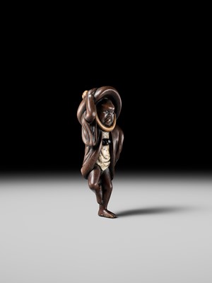 Lot 216 - MIWA: A RARE WOOD NETSUKE OF A SPARROW DANCER