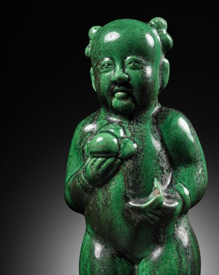 Lot 584 - AN ORMOLU-MOUNTED AND EMERALD GREEN-GLAZED FIGURE OF A BOY, QING DYNASTY