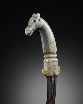 Lot 208 - A GILT AND GEM-INLAID MUGHAL JADE ‘HORSE’ DAGGER, KHANJAR, 17TH-18TH CENTURY