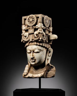 Lot 201 - A MAGNIFICENT WHITE MARBLE HEAD OF A DHARMIC DEITY, WESTERN INDIA