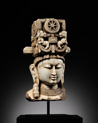 Lot 201 - A MAGNIFICENT WHITE MARBLE HEAD OF A DHARMIC DEITY, WESTERN INDIA