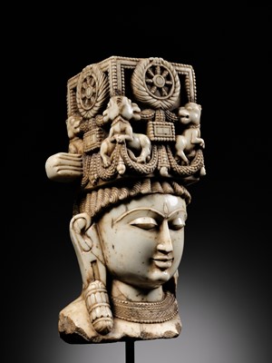 Lot 201 - A MAGNIFICENT WHITE MARBLE HEAD OF A DHARMIC DEITY, WESTERN INDIA