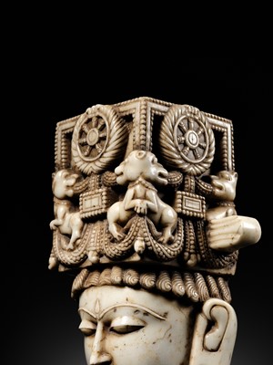 Lot 201 - A MAGNIFICENT WHITE MARBLE HEAD OF A DHARMIC DEITY, WESTERN INDIA