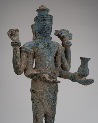 Lot 1307 - A SMALL KHMER BRONZE FIGURE OF AVALOKITESHVARA, ANGKOR PERIOD