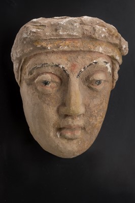 Lot 1014 - A SMALL STUCCO HEAD, GANDHARA, 3RD TO 4TH CENTURY