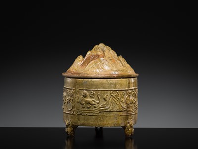 Lot 219 - A GREEN-GLAZED POTTERY ‘HILL’ TRIPOD JAR AND COVER, LIAN, HAN DYNASTY