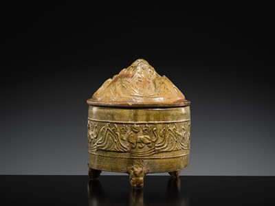 Lot 219 - A GREEN-GLAZED POTTERY ‘HILL’ TRIPOD JAR AND COVER, LIAN, HAN DYNASTY