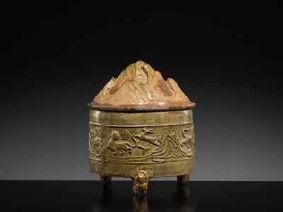 Lot 219 - A GREEN-GLAZED POTTERY ‘HILL’ TRIPOD JAR AND COVER, LIAN, HAN DYNASTY