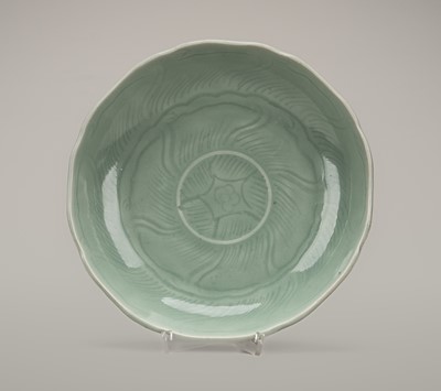 Lot 909 - A CARVED LONGQUAN CELADON DISH, QING DYNASTY