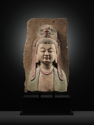 Lot 332 - A RARE PAINTED LIMESTONE RELIEF OF GUANYIN, NORTHERN WEI TO SUI DYNASTY