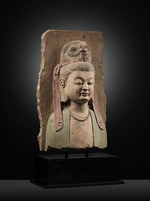Lot 332 - A RARE PAINTED LIMESTONE RELIEF OF GUANYIN, NORTHERN WEI TO SUI DYNASTY