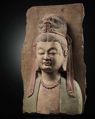 Lot 332 - A RARE PAINTED LIMESTONE RELIEF OF GUANYIN, NORTHERN WEI TO SUI DYNASTY