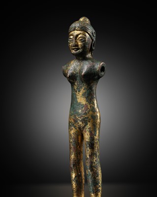 Lot 330 - A SMALL GILT-BRONZE FIGURE OF A WOMAN, WESTERN HAN DYNASTY