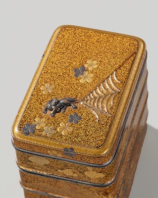 Lot 328 - A FINE SILVER AND GOLD-INLAID LACQUER JU-KOBAKO (SMALL TIERED BOX) AND COVER WITH A HORSE, CHERRY BLOSSOMS AND SPIDERWEB