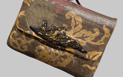 Lot 36 - A FINE SILK BROCADE TAKABO-IRE WITH A KANAMONO DEPICTING RYUJIN AND OTOHIME