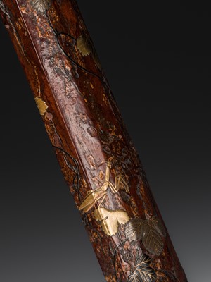 Lot 65 - BUNSAI: A LACQUERED WOOD KISERUZUTSU (PIPE CASE) WITH LEAFY VINES AND A MANTIS