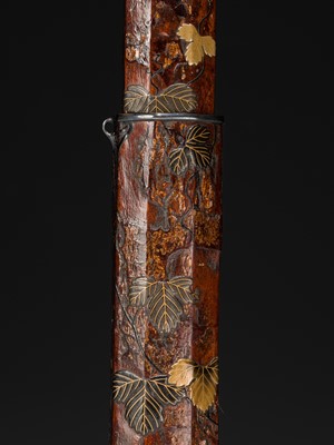 Lot 65 - BUNSAI: A LACQUERED WOOD KISERUZUTSU (PIPE CASE) WITH LEAFY VINES AND A MANTIS