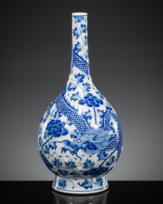 Lot 294 - A LARGE BLUE AND WHITE ‘DRAGON’ BOTTLE VASE, 19TH CENTURY