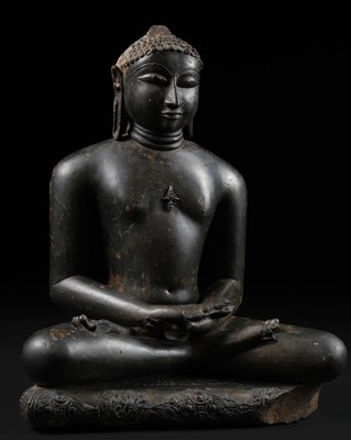 Lot 198 - AN IMPORTANT POLISHED BLACK STONE FIGURE OF MAHAVIRA, THE HISTORICAL FOUNDER OF JAINISM, DATED 1098